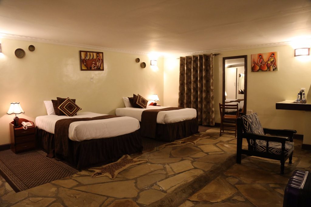 Tiloreza Volcanoes Ecolodge or Da Vinci Gorilla Lodge